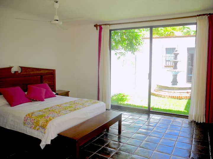 dormitorio principal con baño en suite