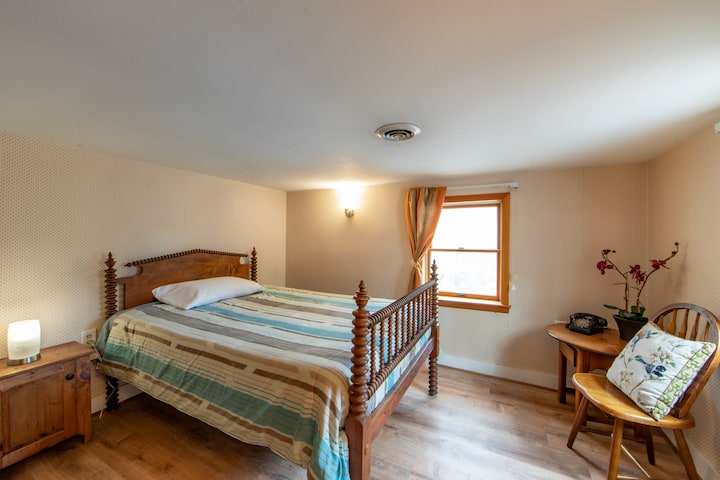 Secondary bedroom with full bed and shared full bathroom in hallway (on 2nd floor).