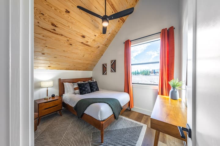 3rd bedroom, located upstairs, sleeps 2. One queen size bed. 