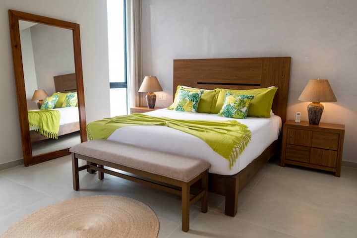 Upstairs, Room 3 offers tranquility with its plush king-sized bed and ensuite bathroom