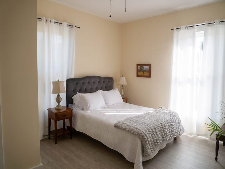 Queen Bedroom has private half bath.