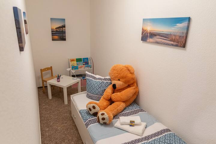 Another person can sleep in the children's room. Here there is room for another baby bed, which can be set up if needed. 
NOTE: This room does not have a window. 