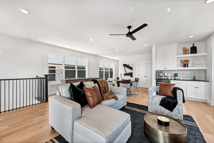 Amazing second floor entertaining area with fireplace, card playing or snack area with 4 seats, SHUFFLEBOARD, wet bar with nugget ice machine and Keurig for coffee.