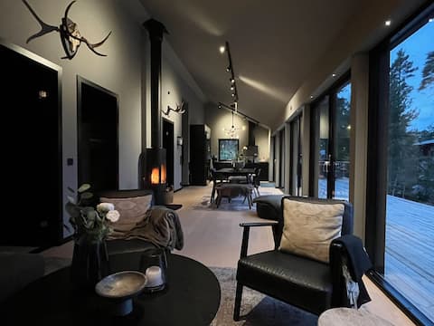 Newly-built house on lake plot near Romme Alpin