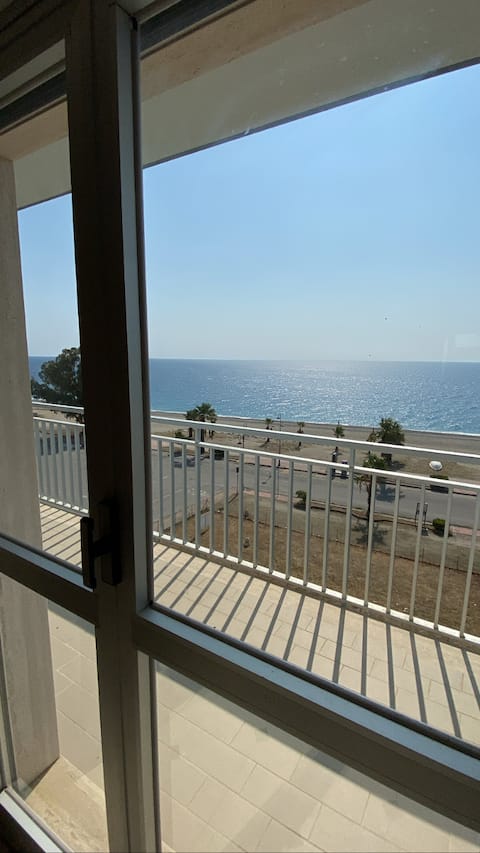 House with a balcony overlooking the sea