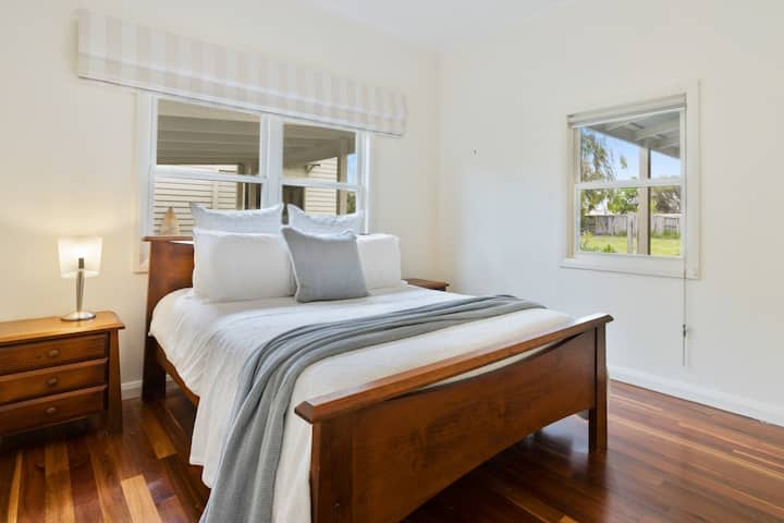 Main House Bedroom 2 | Queen bed with large built-in-robe storage.