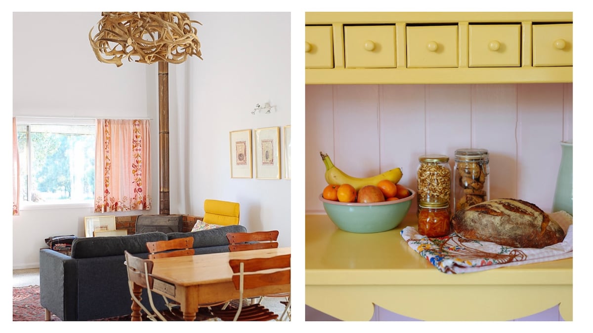 A spacious living area features a comfortable dark sofa and a wooden dining table surrounded by chairs. Natural light enters through a large window adorned with bright curtains. The second image displays a cheerful yellow shelf holding a bowl of fruits, jars of snacks, and a freshly baked loaf of bread.
