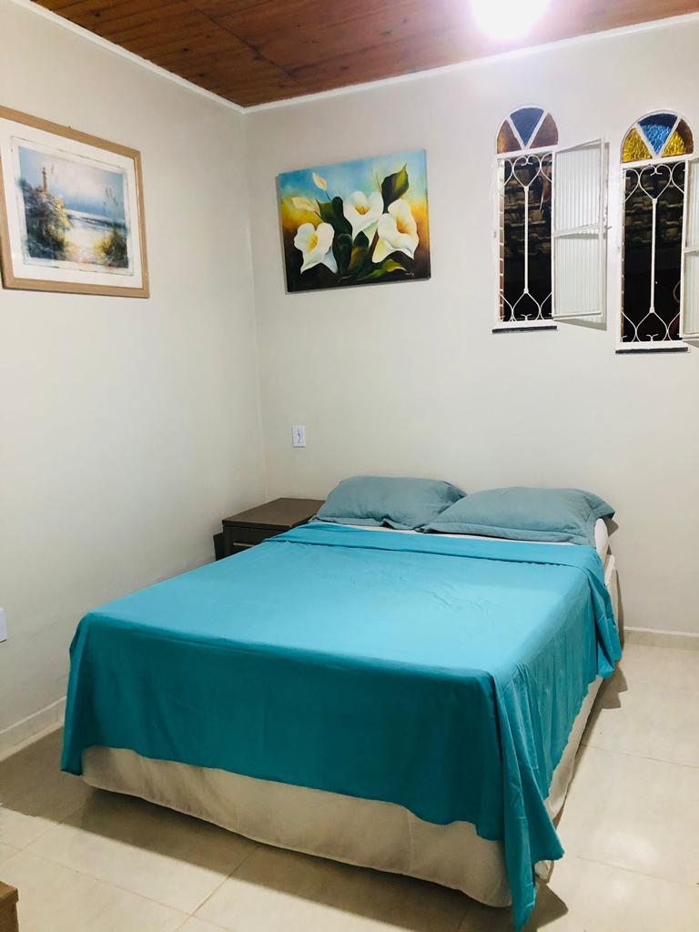 A bedroom with a double bed, in the other bedroom we have a double and 3 single mattress.