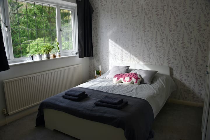 This is our first floor double bedroom, next to the upstairs bathroom. It overlooks the back garden and has a large wardrobe. We call it the grey room.
There is a bathroom next to this room.