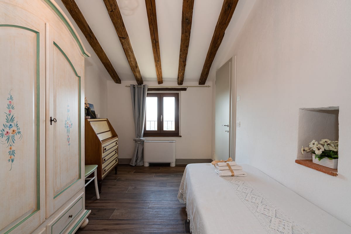 Antico Casale — Piscina privata e vista su Cortona — 19
