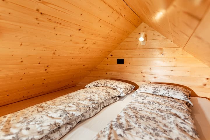 Bed on the upper part of the house
