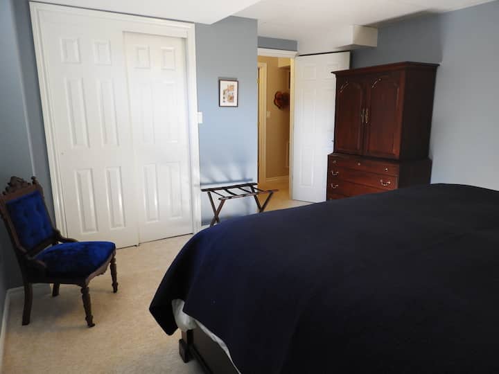 There is a TV in this cupboard to watch whatever is on in the living area. The large closet has hangers and two luxurious bathrobes for your use to go outside to the hot tub. 