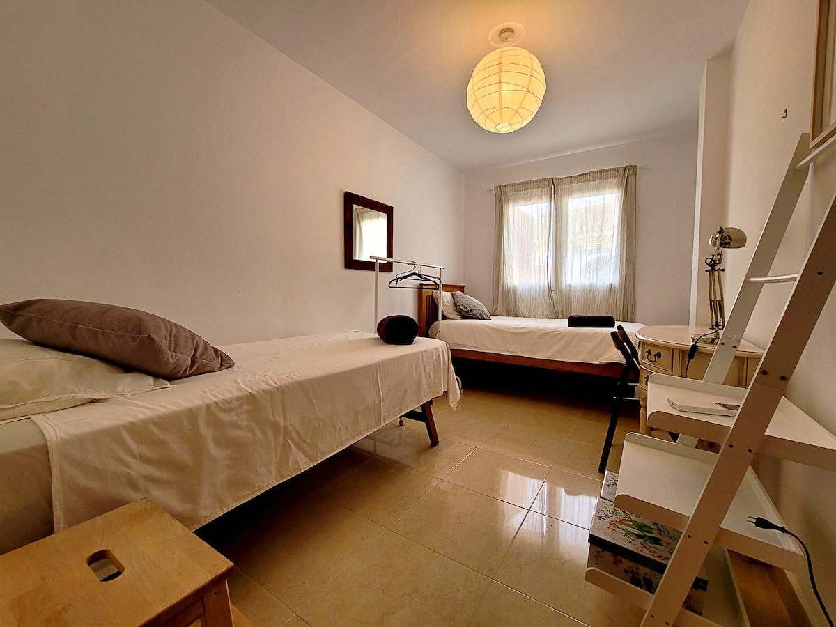 Dormitorio individual doble