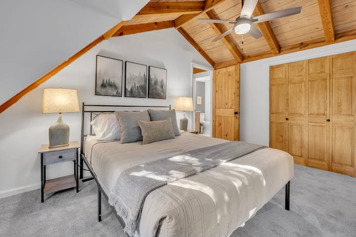 The second upstairs queen bedroom- a blend of comfort and elegance.