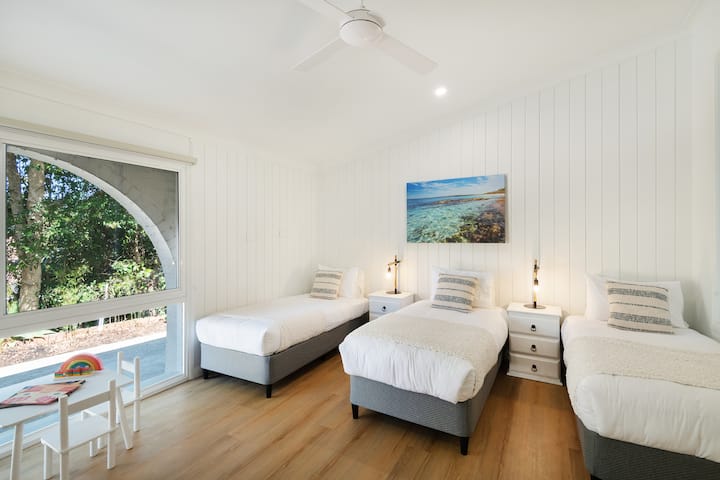 Enjoy space for all the kids with 4 single beds in our 3rd bedroom and plenty of space to play