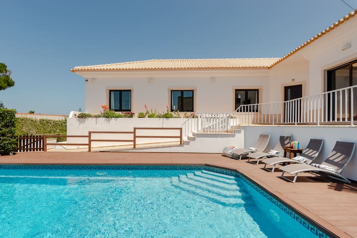 Relax on the sunny pool deck. Children friendly gallery image 2