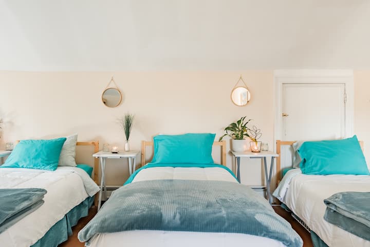 Comfortable twin beds with special memory foam toppers, soft pillow and luxurious linens.  Located in the Reunion's Room on the third flood, perfect for families, old friends or old roommates to gather, reminisce and laugh until late into the night.