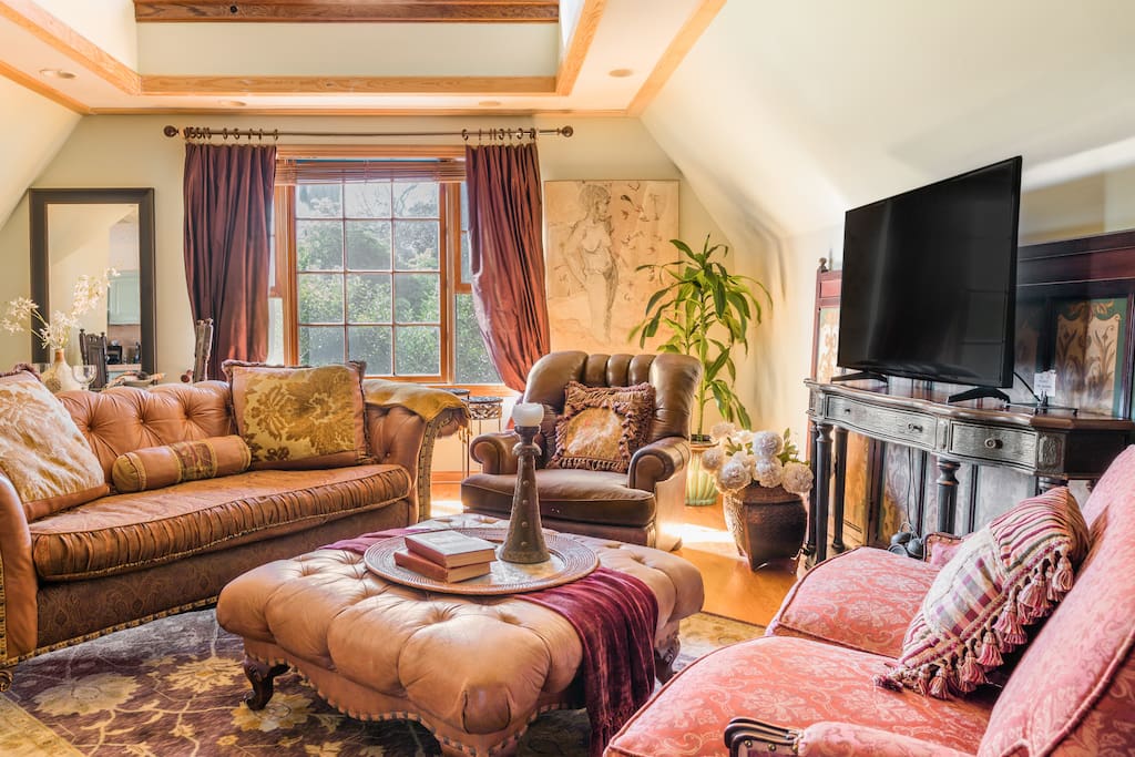 Spacious Tudor Home with Deck and Hillside View