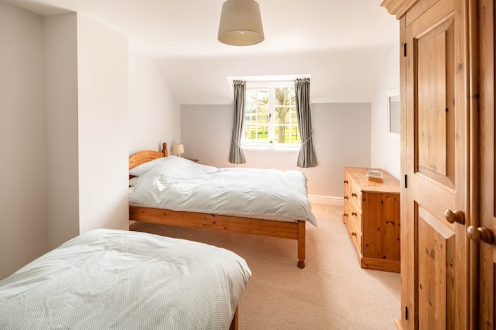 Garden views and beyond llamas, sheep and chickens in the paddocks