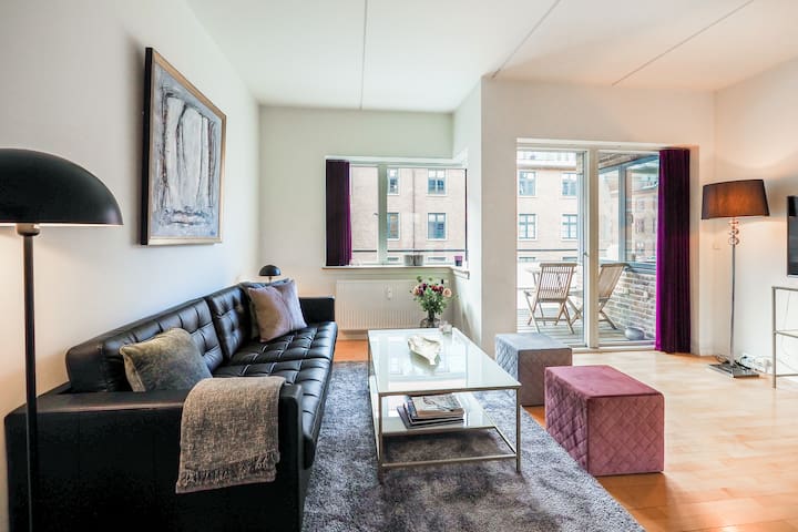 Explore the Tivoli Gardens from a City Center Apartment