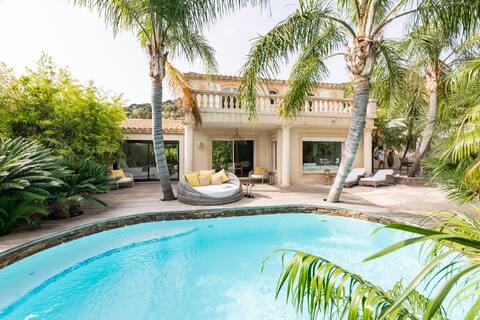 Treat yourself to a private club vibe near Almanarre Beach