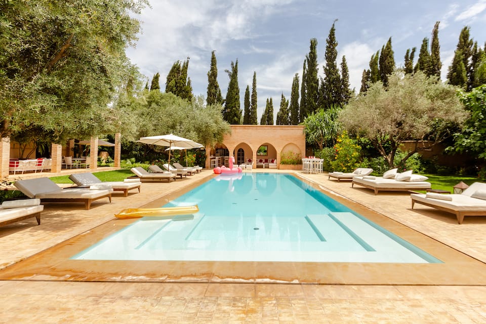 A red-brick villa in a one-hectare Marrakech garden, Marrakech, Marrakech-Safi, Morocco, photo 1 of 10