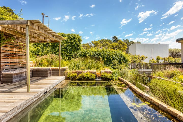 Solar-Powered Mountain Retreat with Natural Pool