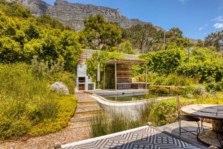 Solar-Powered Mountain Retreat with Natural Pool gallery image 4