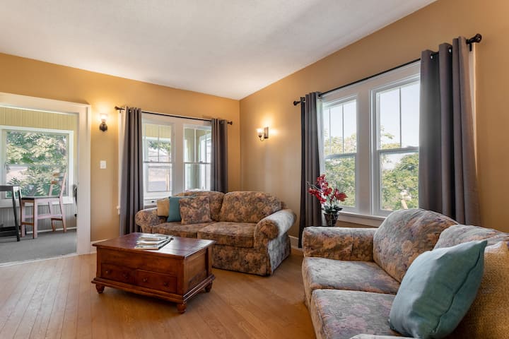 Living room looking onto enclosed veranda.
