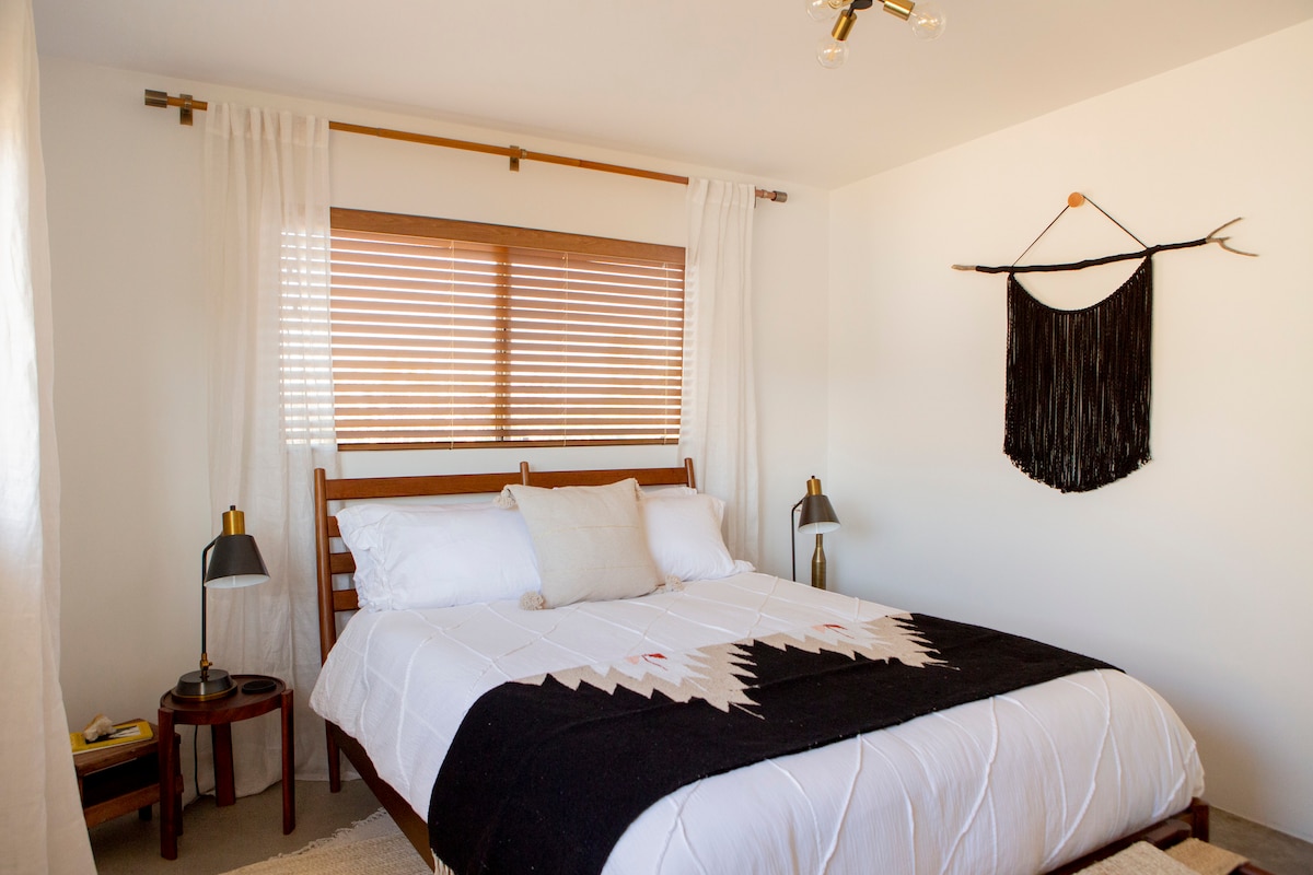 The second bedroom is perfect if you prefer a darker room with more open space.