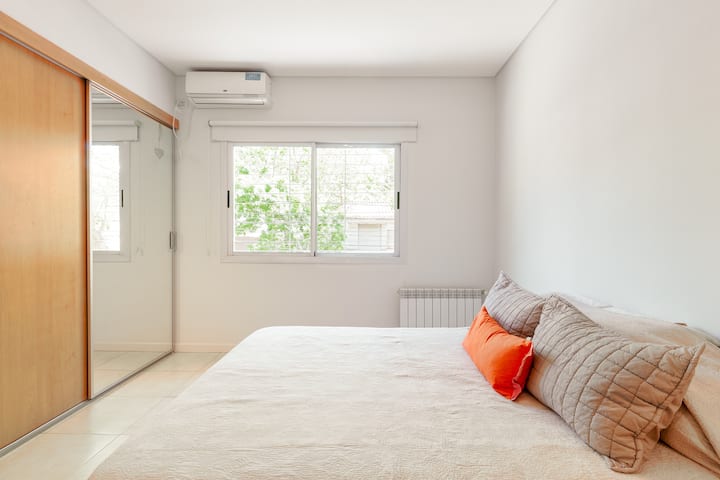 Main bedroom  with great closet space. Ac unit and central heating system.