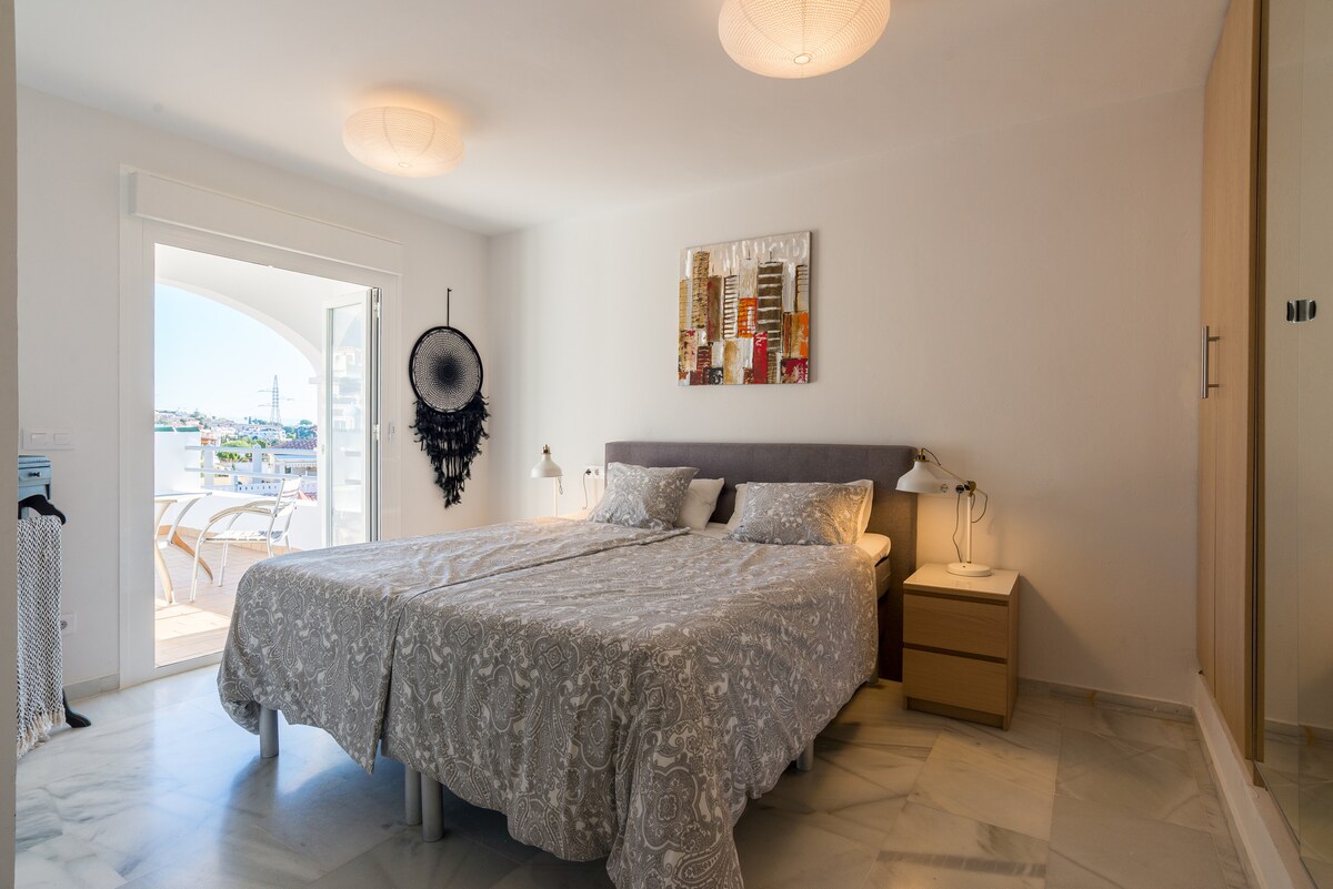 Master bedroom with access to a terrace