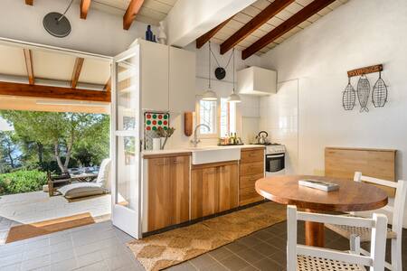 House in the forest with sea views