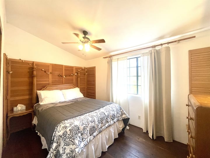 Second bedroom with queen bed & blackout curtains