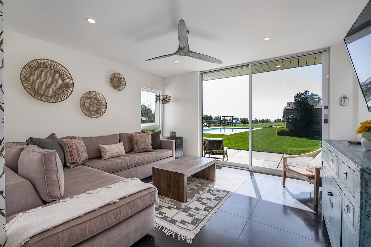 Relax in luxury with a private pool and access to Prime Video on your 65" Smart TV.