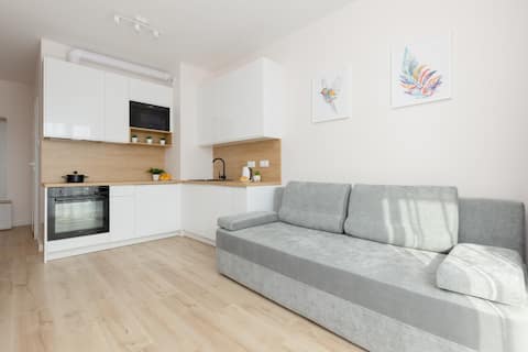 Successful Airbnb property: Bright Apartment with Balcony | Parking | Workspac in Włochy