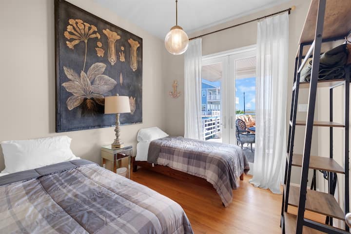 2 camas individuales en el piso principal