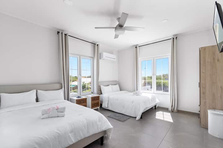 Experience ultimate comfort and elegance in this modern bedroom.