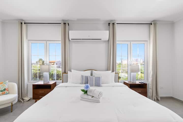 Serene sophistication awaits in this luxurious bedroom retreat.