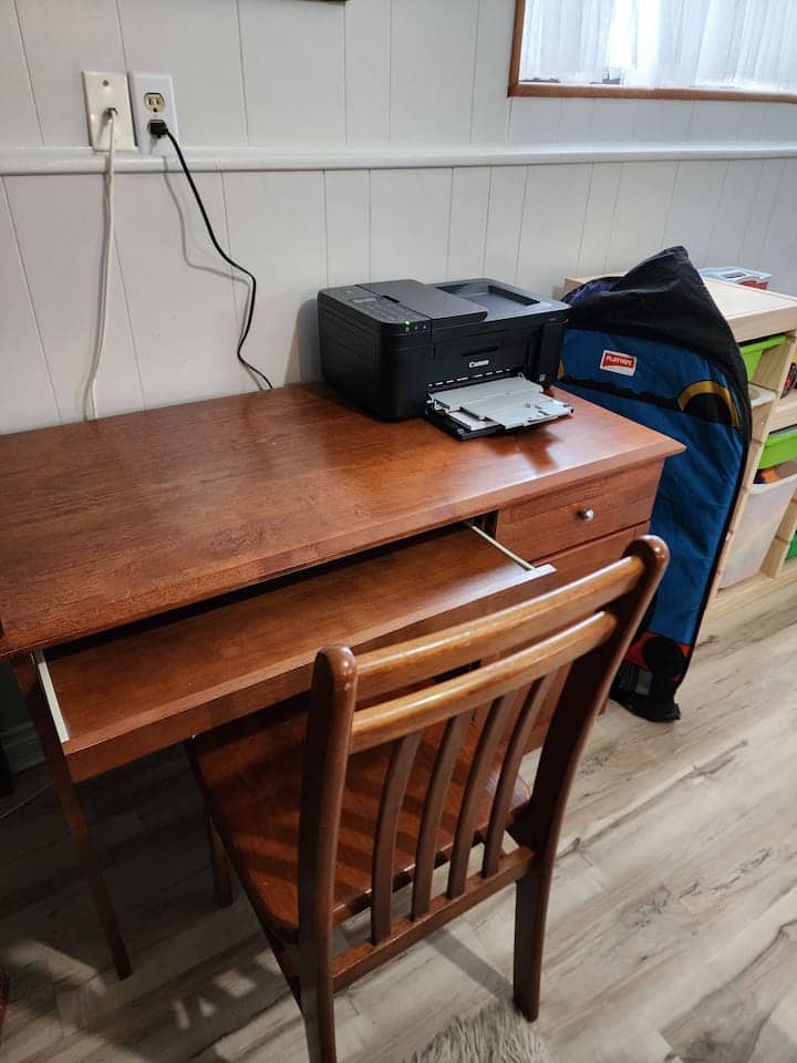 Dedicated workspace with a printer.