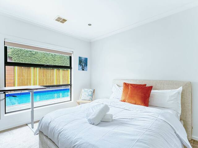 Elegant Poolside Serenity Stay gallery image 3