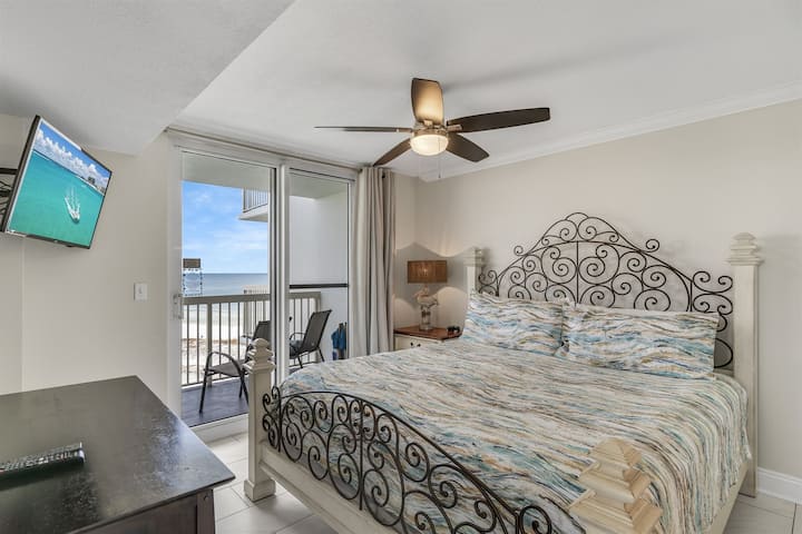 Master bedroom with king bed and Smart TV