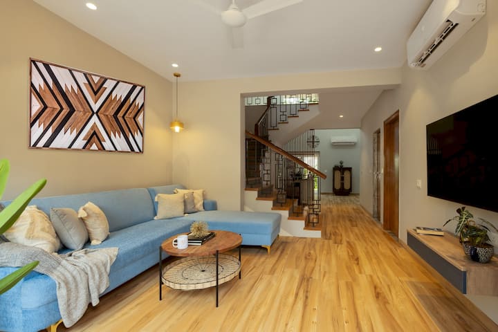 Expansive and elegantly furnished, the living room is designed to be a perfect blend of luxury and comfort.
