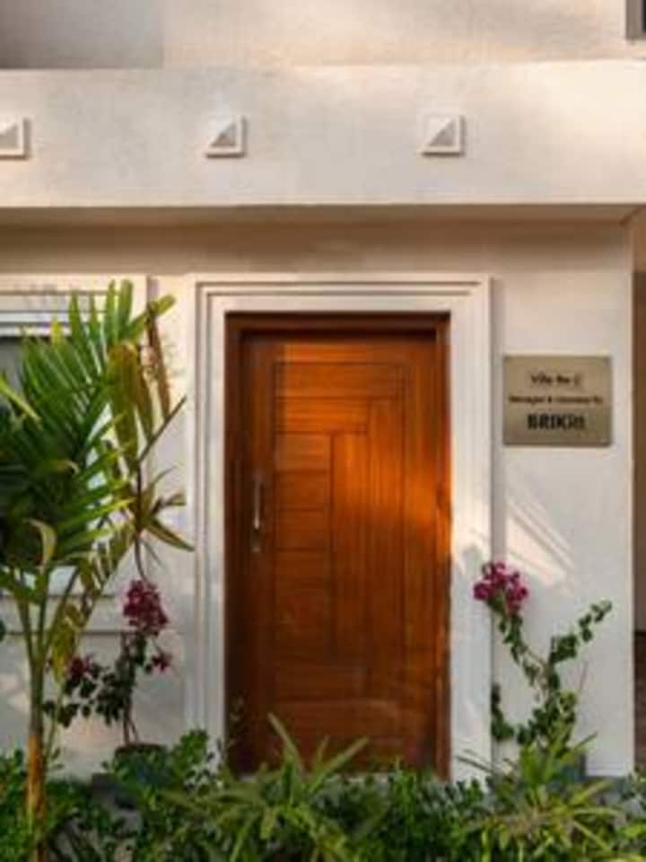 Images of the entryway and common areas to highlight the villa’s luxurious design.