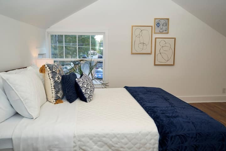 Upstairs bedroom with a Queen bed