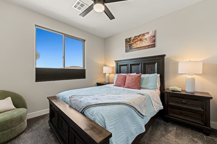 Guest room #1 has a queen bed, smart TV, and large closet.