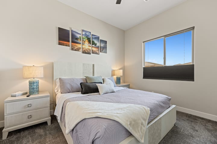 Primary #2 bedroom with king bed, smart TV, attached bath and walk-in closet.