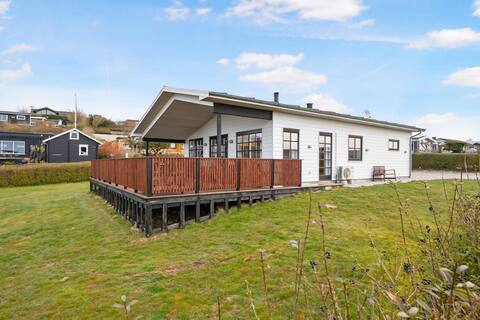 Beautiful holiday home by Følle Strand with "sea.
