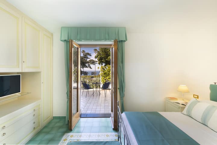 Dormitorio 5 - Dormitorio con cama matrimonial y acceso al balcón