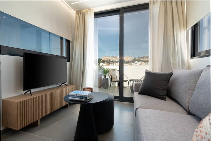 The living room has all the latest tech, from a big smart TV to A/C, so you can
kick back and binge-watch your favourite shows in style.